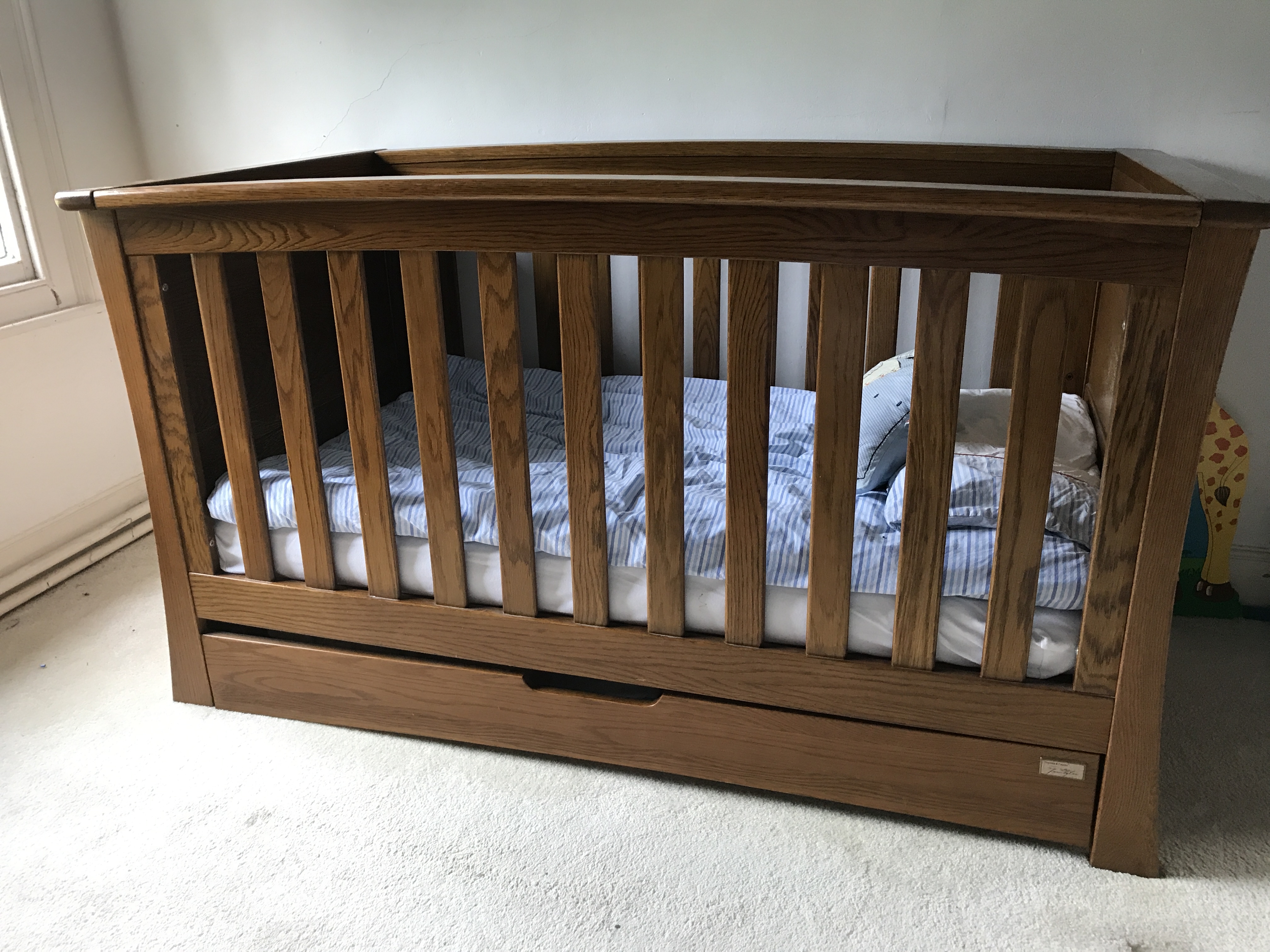 solid oak cot bed
