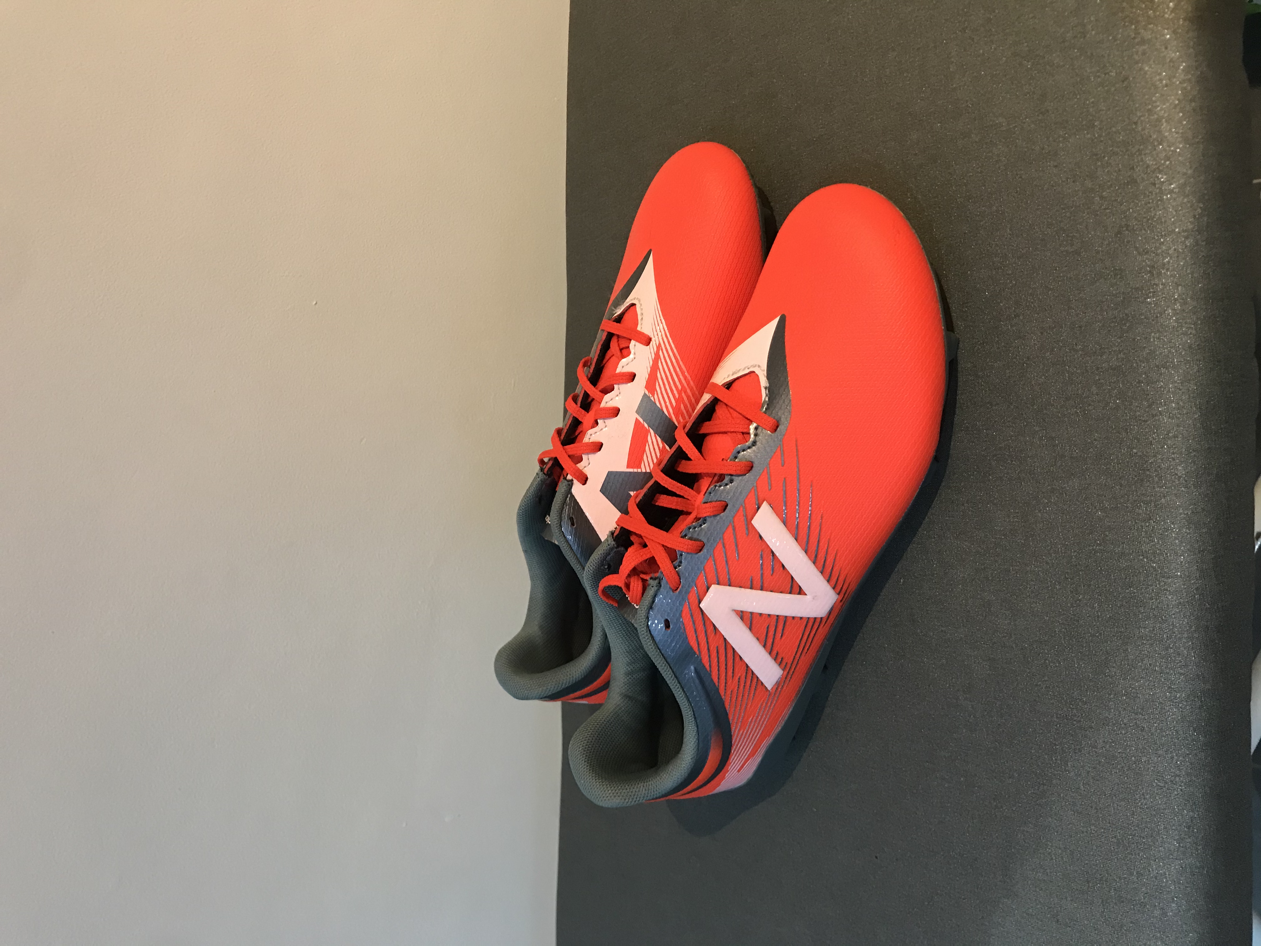 new balance football boots kids for sale