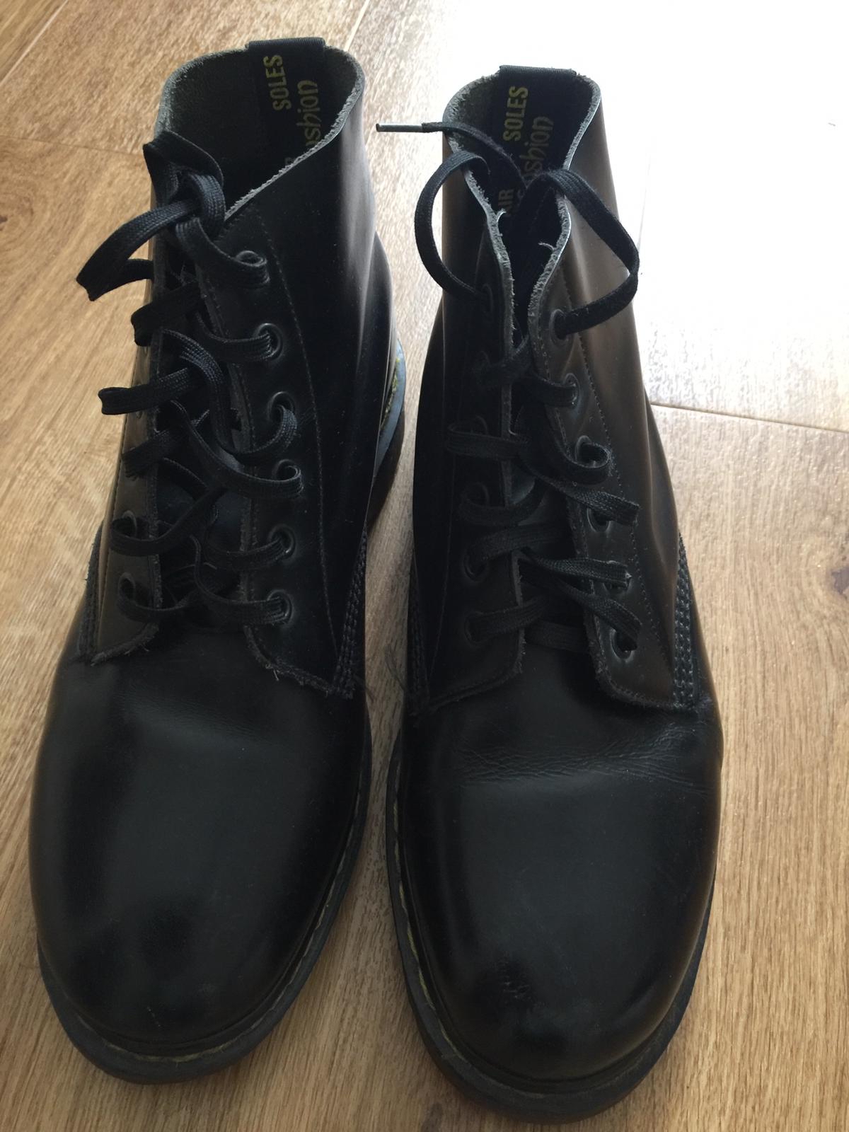 all black doc marten boots